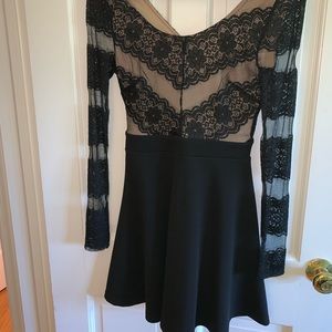 Black long sleeved cocktail dress !